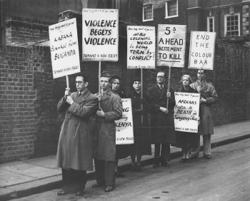 Photograph of protesters with placards at Non-Violent Resistance Group demonstration against colonial policy (Cwl HBP 1/19 image 22). Photographer and date unknown.